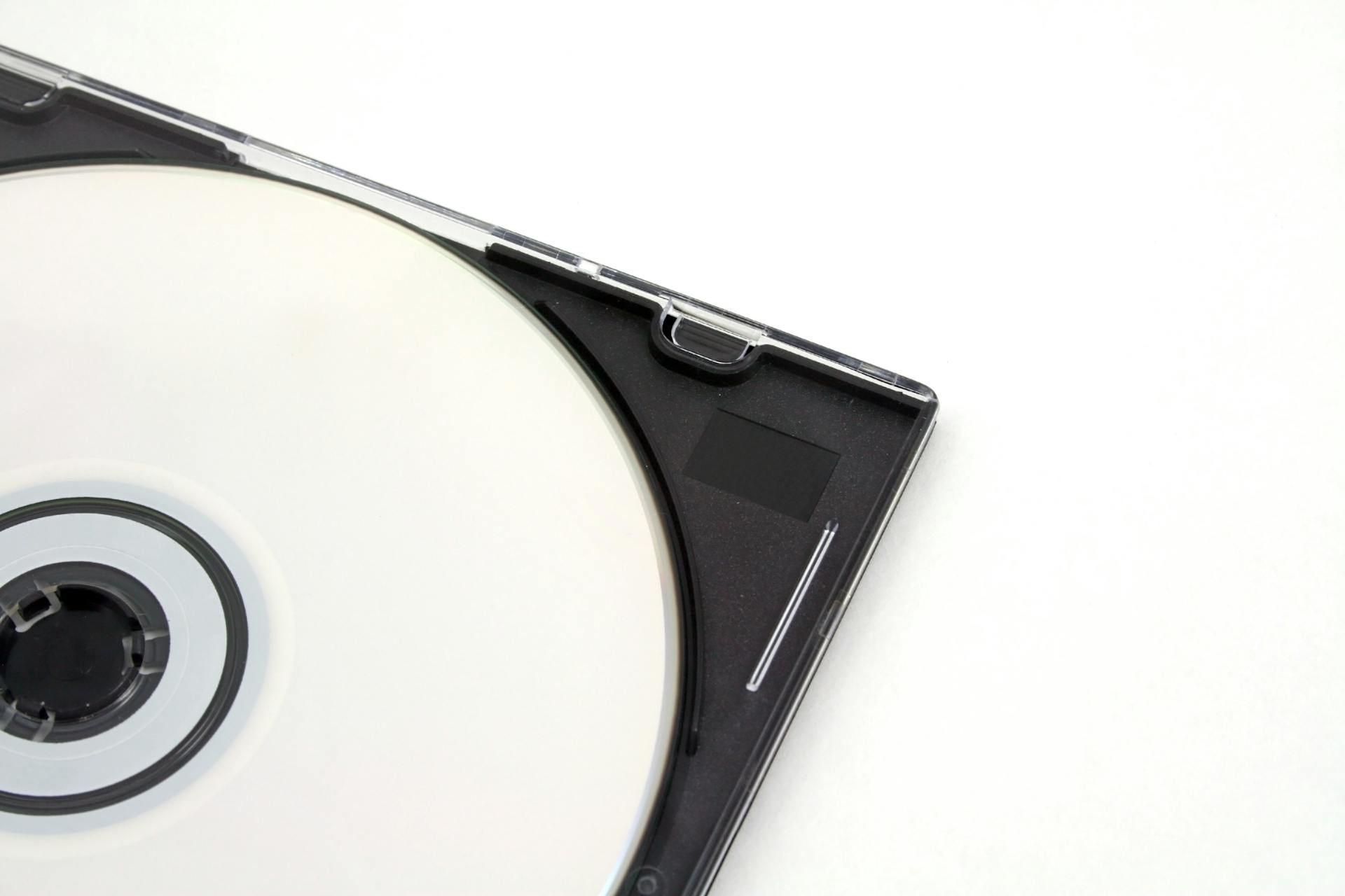 High-quality image of an unused CD in a jewel case, perfect for technology concepts.