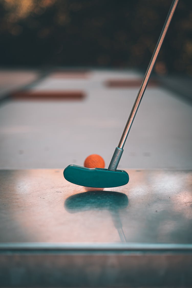 Putter Near A Golf Ball