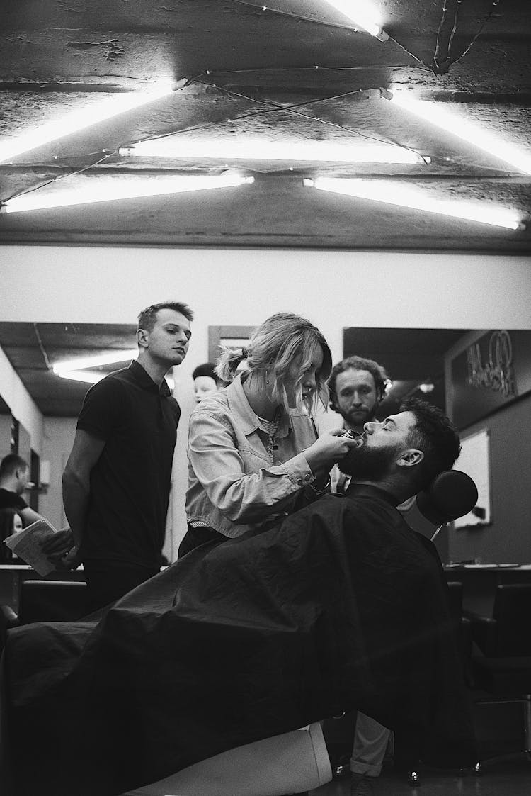 Man In Chair In Barbershop