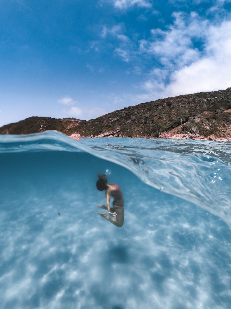 Person Swimming Under Water