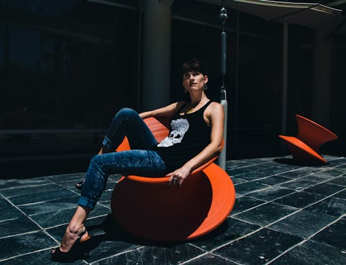 A Woman Sitting on a Customize chair