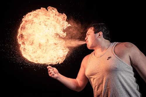 Man Blowing Fire from His Mouth