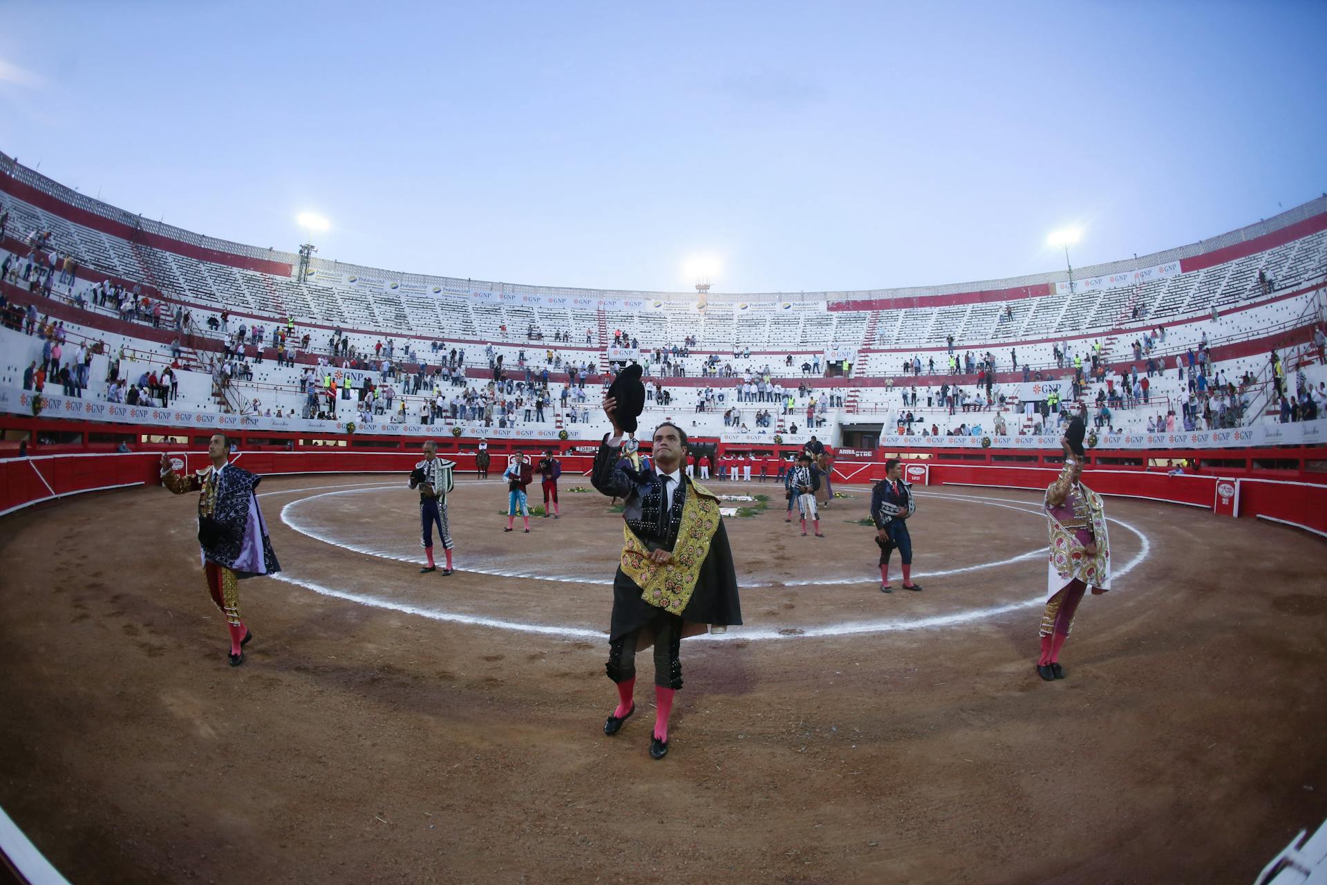 Photo of a traditional bullfighting event in a vibrant arena in Monterrey, Mexico.