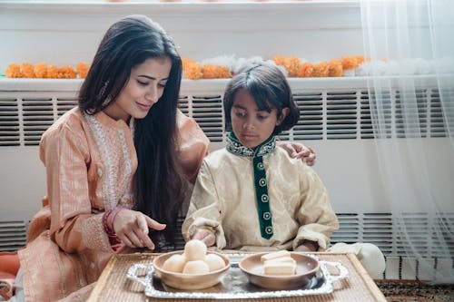 Free 2 Women Sitting by the Table Stock Photo