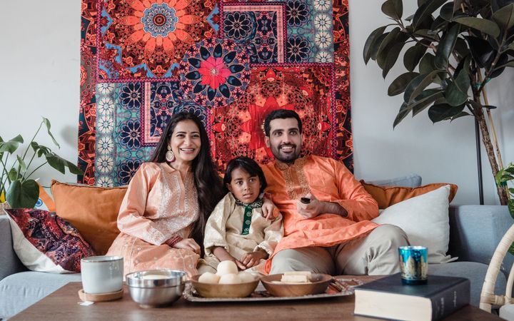 A family at home in their living room