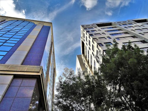 Concrete Building Photo Under Cloudy Sky