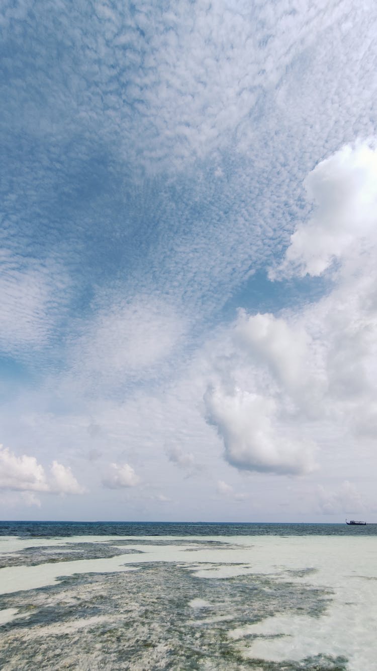 View Of Cirrus Clouds In Blue Sky