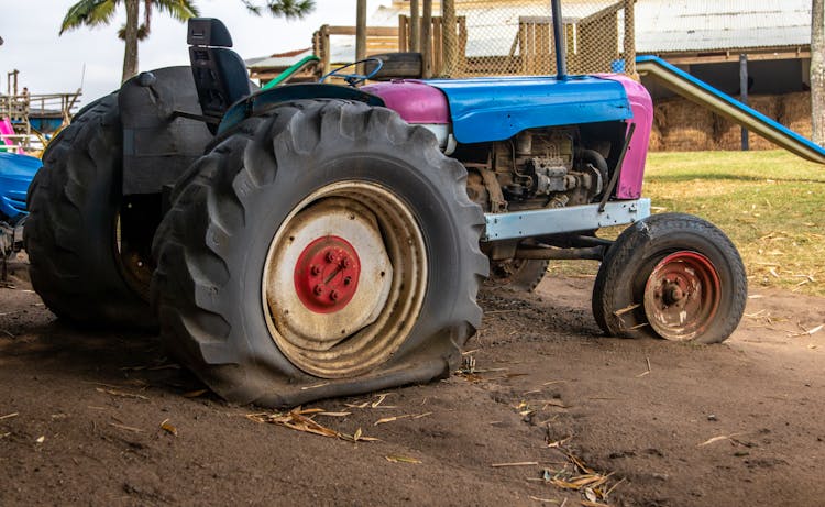 Photo Of A Tractor With Flat Tires