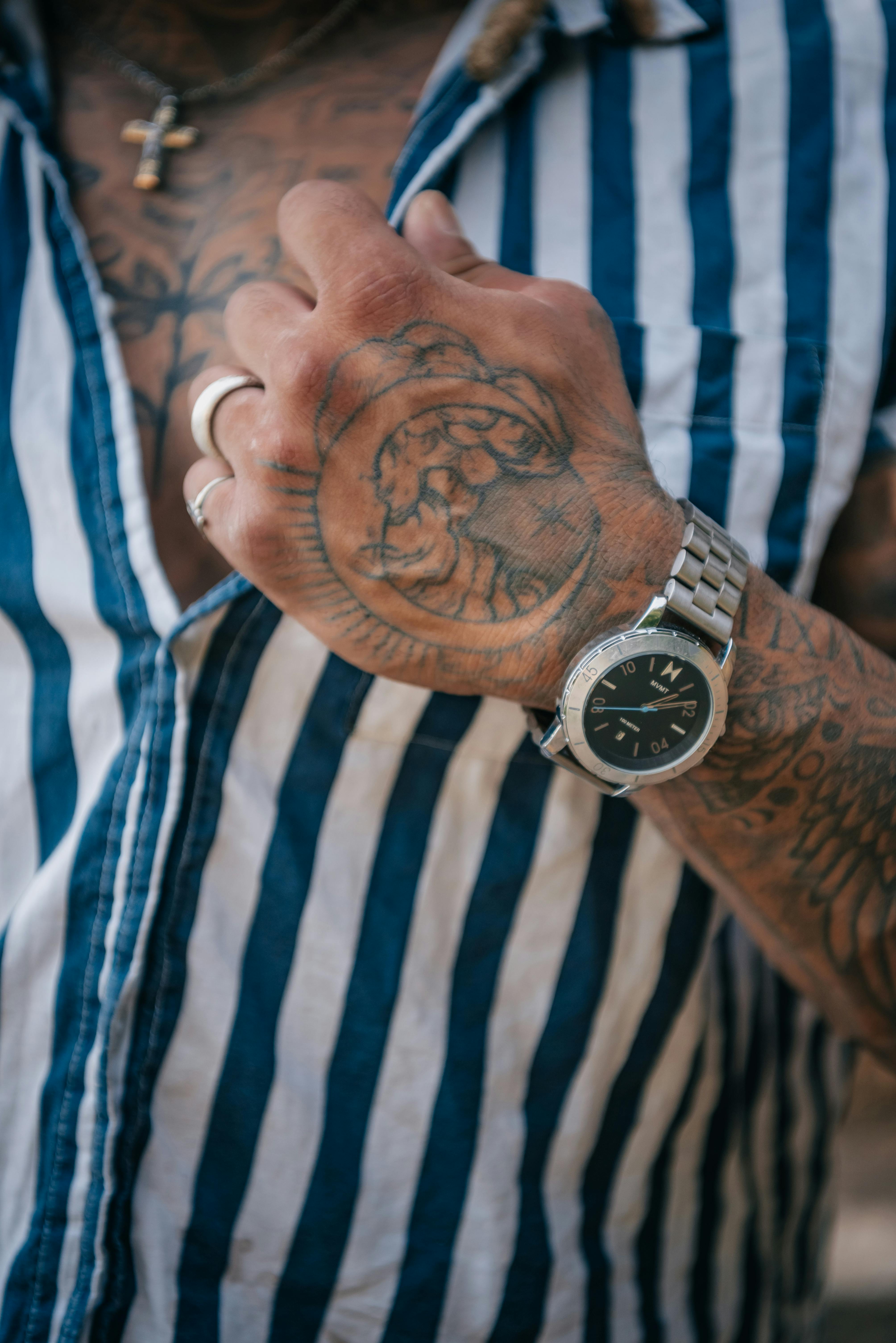 Tattoo wrist watch hi-res stock photography and images - Page 2 - Alamy