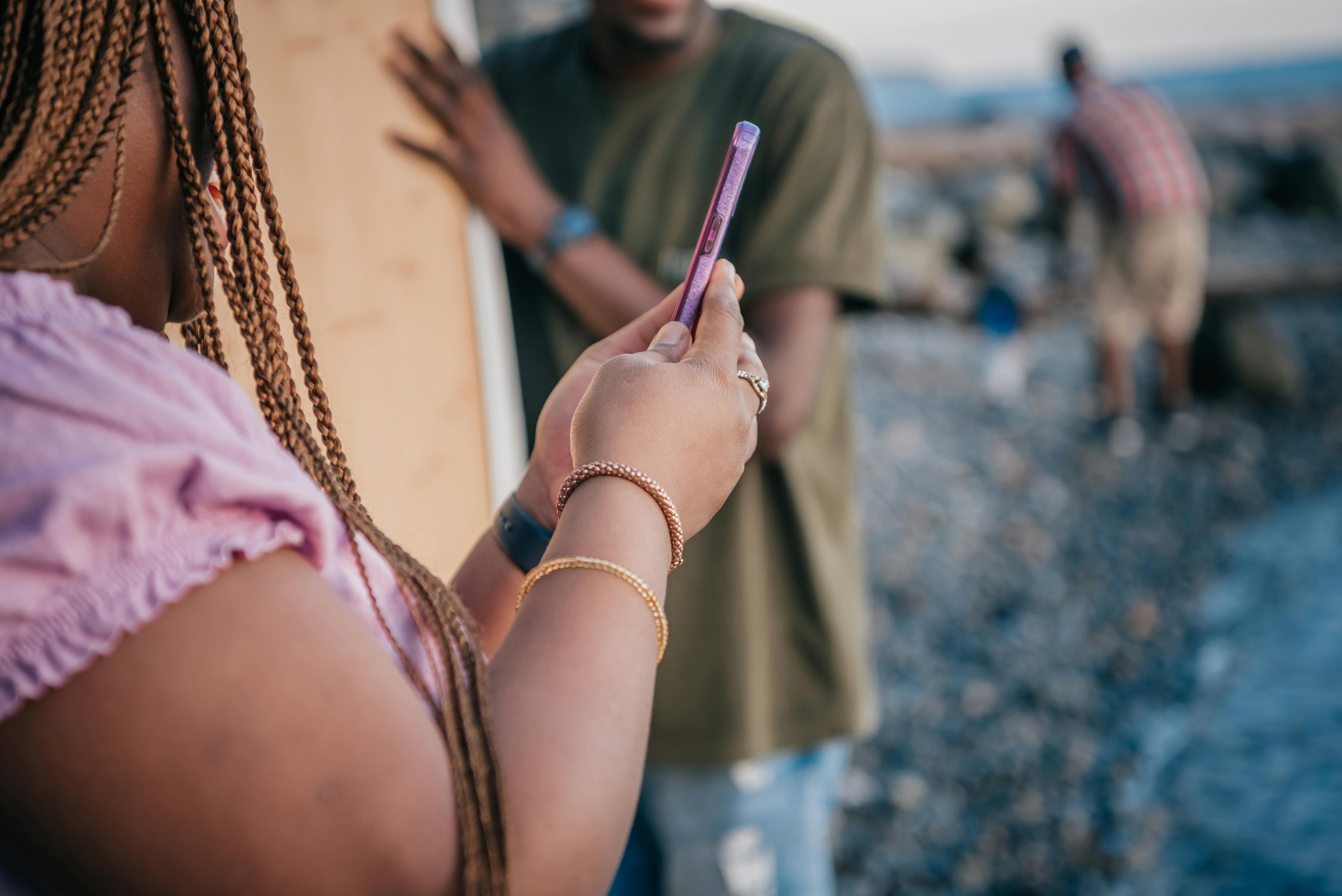 close up shot of a person holding a cellphone