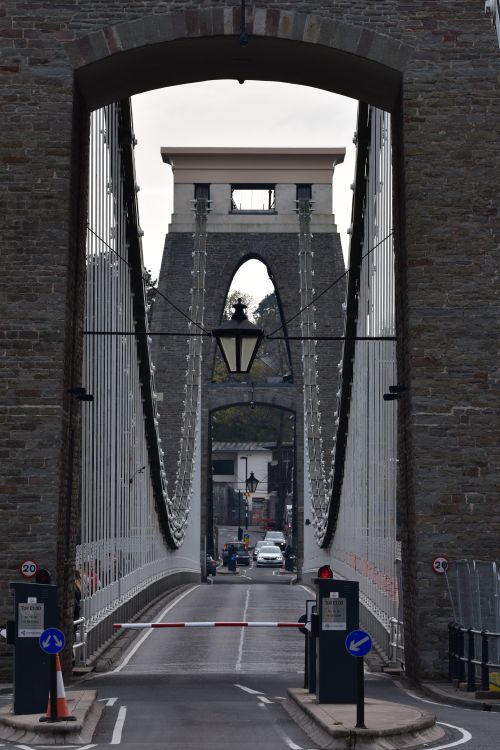 Free People Walking on Brown Brick Bridge Stock Photo
