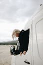 Woman Looking out Van Window