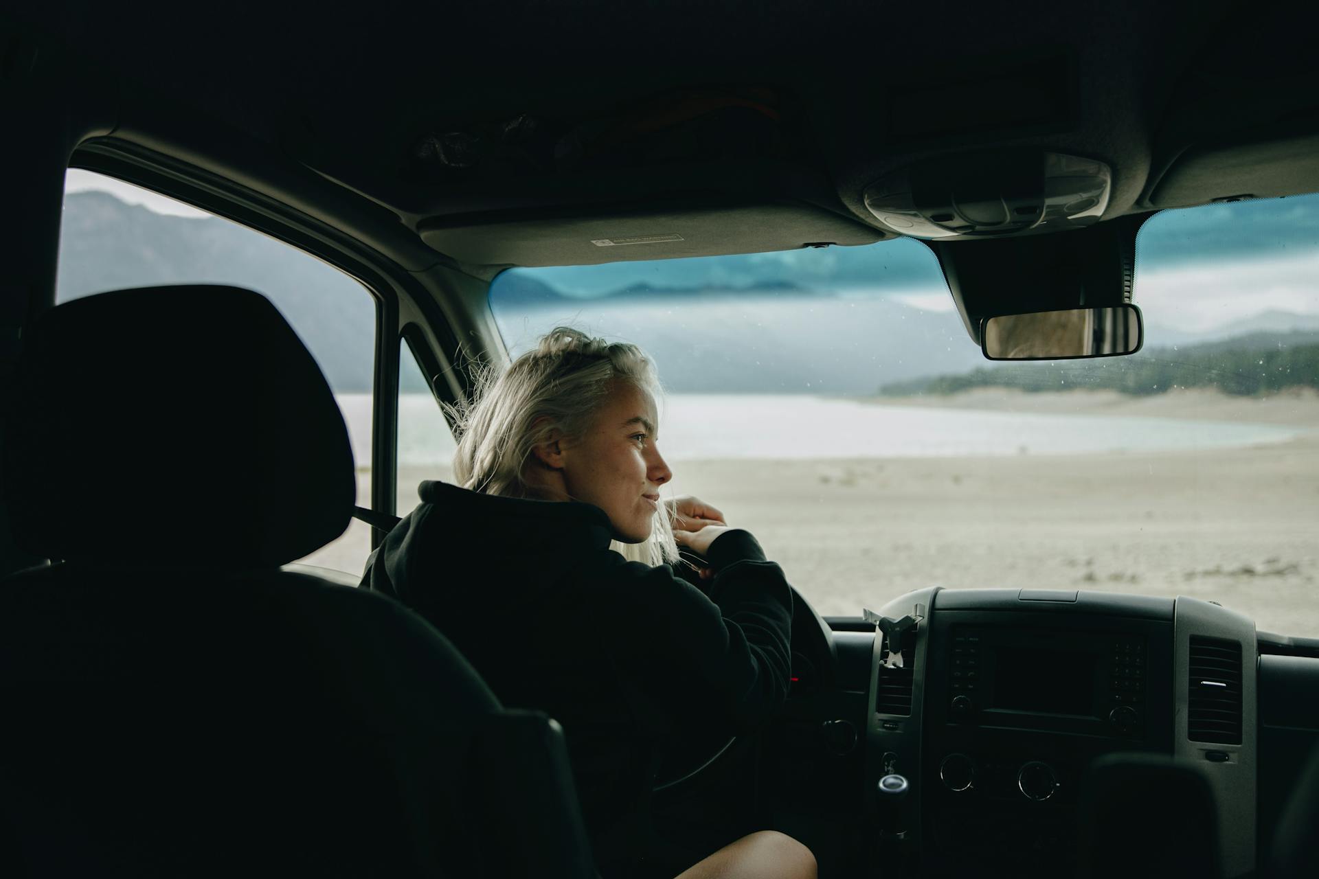 A Woman Driving a Car