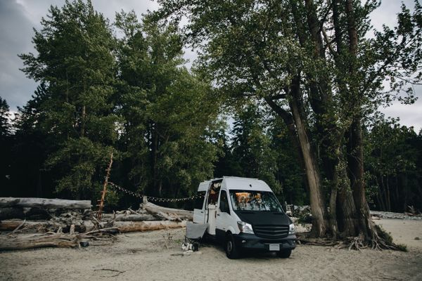 Camper van parked at a forest edge — photo by PNW Production on Pexels