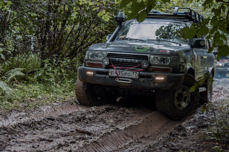 Toyota Car On Mud Road