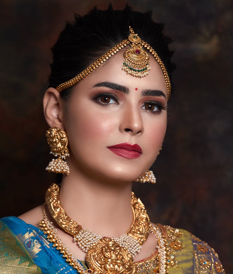 Woman With Golden Jewelry