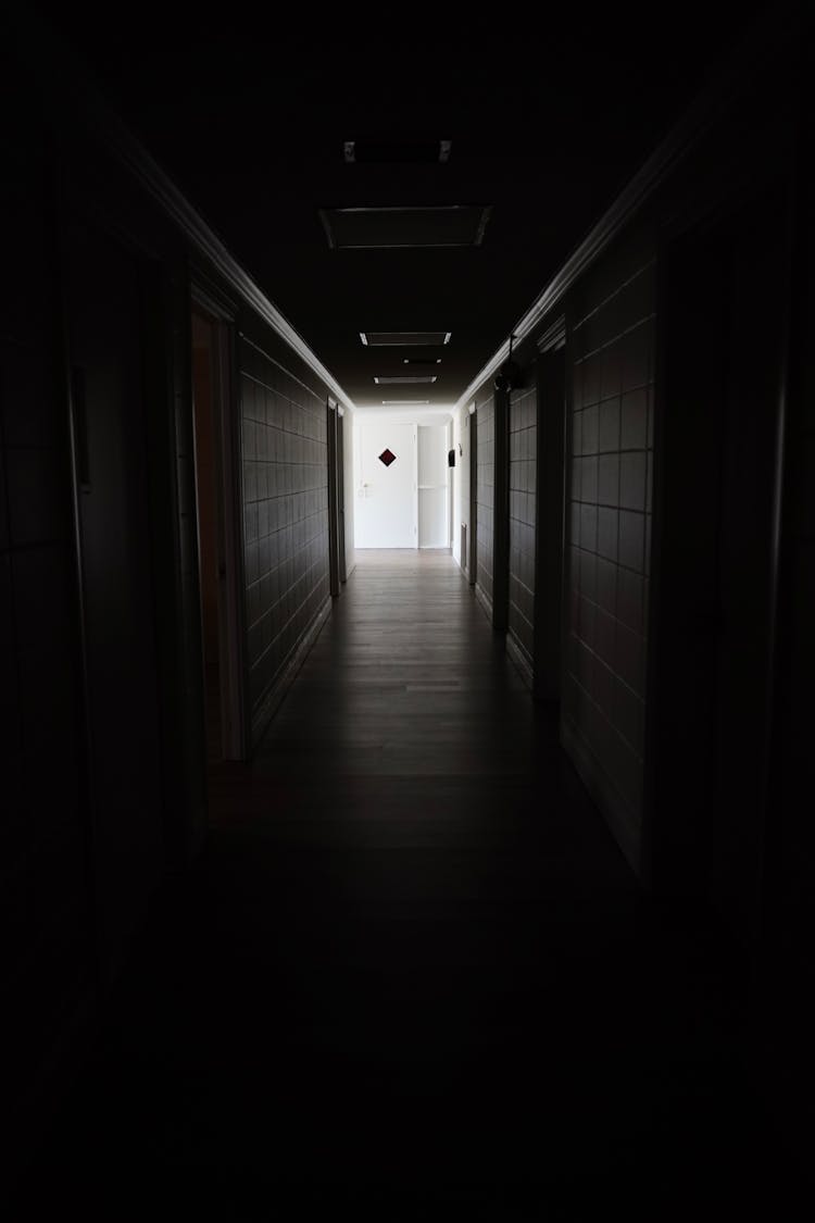 A Dark Hallway Of A Building