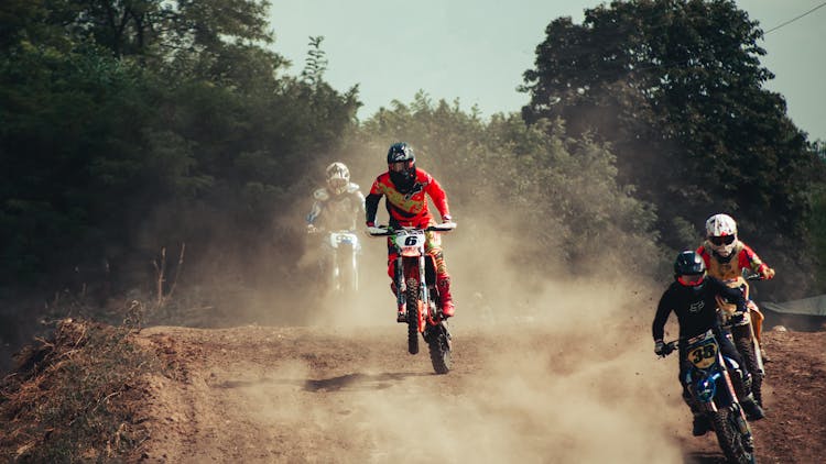 Motocross Competitors Racing On Motors