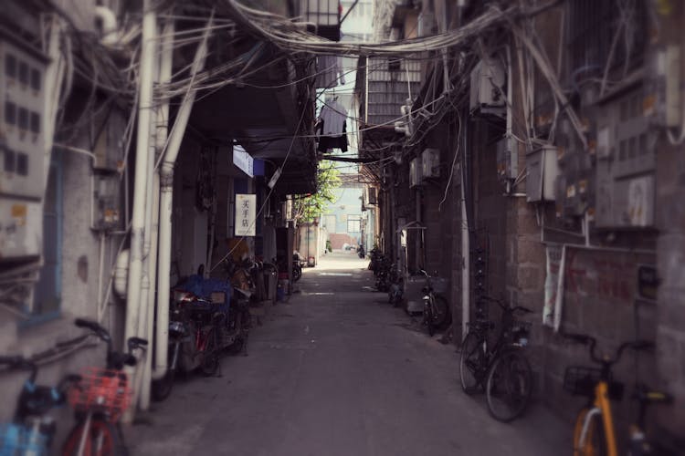 Empty Alley With Bicycles In Town