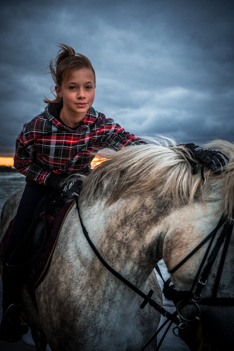 Girl Riding Horse