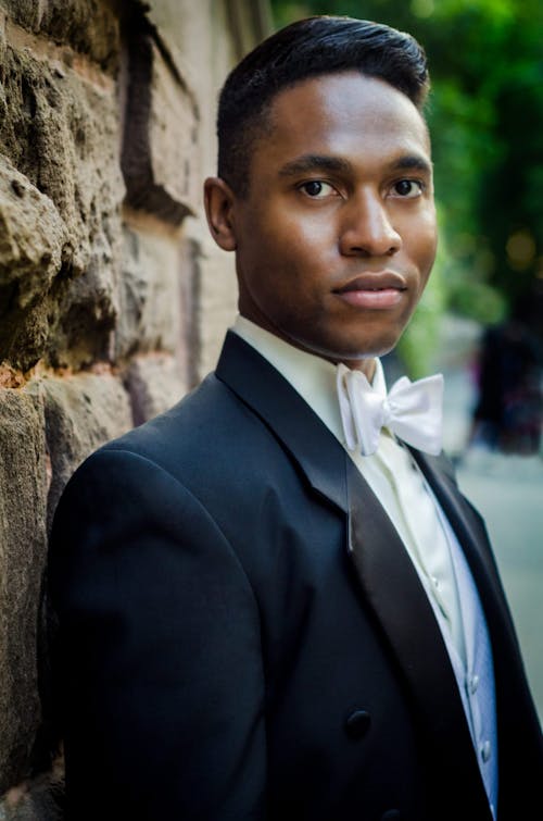 Selective Focus Photography of Man in Black Suit