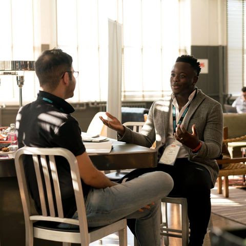 Mentor in conversation with a young professional — mentors and supervisors