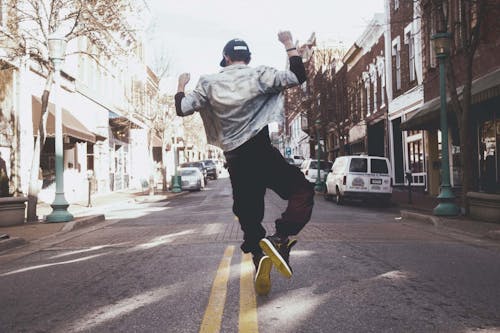 Photo of Man Dancing in the Street