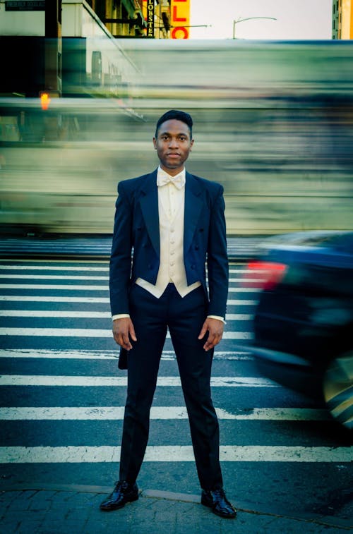 Man in Black Formal Suit Jacket on the Street