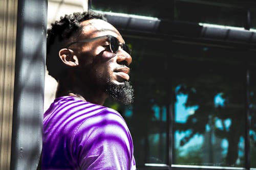 Man Wearing Purple T-shirt