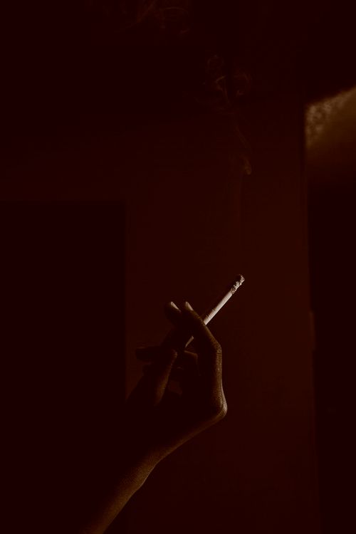 A Person Smoking Cigarette · Free Stock Photo