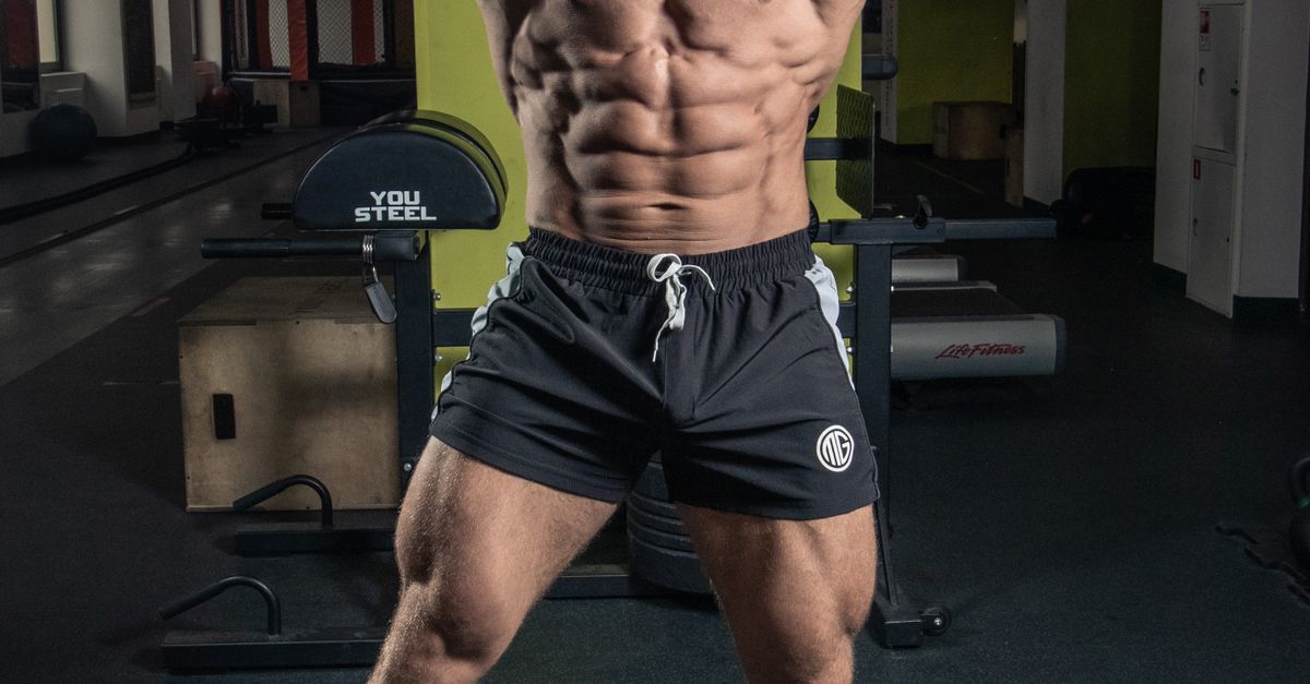 Man Let Muscle A Shirtless Man Flexing His Muscles · Free Stock Photo