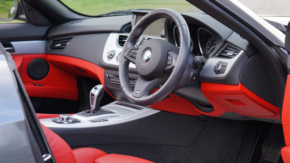 How Convertible Car Seats Like Graco 4Ever Solve Infant-to-Toddler Travel Challenges Explore the sleek and luxurious interior of a BMW Z4 featuring vibrant red accents and modern design.