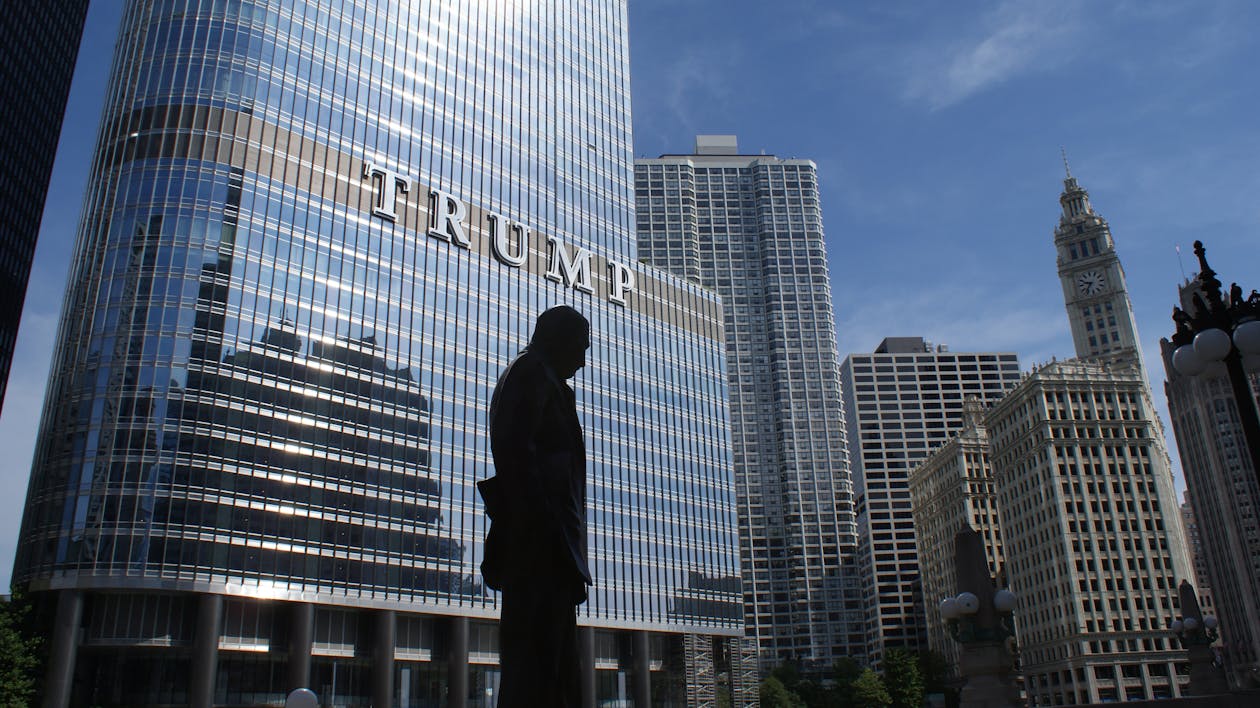 Free Silhouette of Statue Near Trump Building at Daytime Stock Photo
