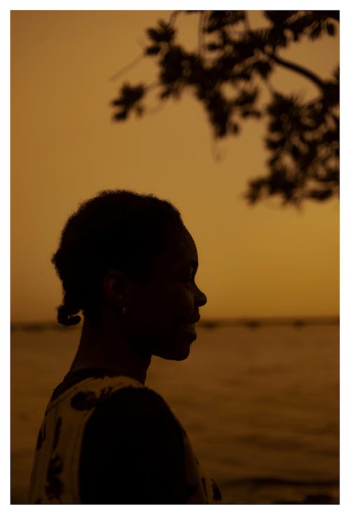 Side View of a Woman during Sunset