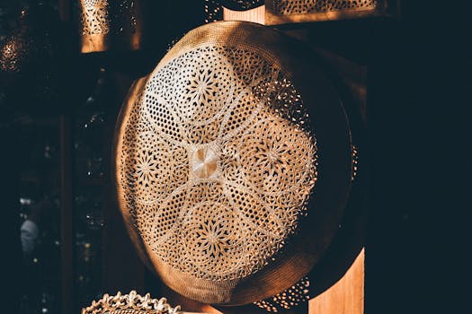 A beautifully crafted Moroccan brass decor piece showcased with intricate designs, illuminated in warm sunlight.