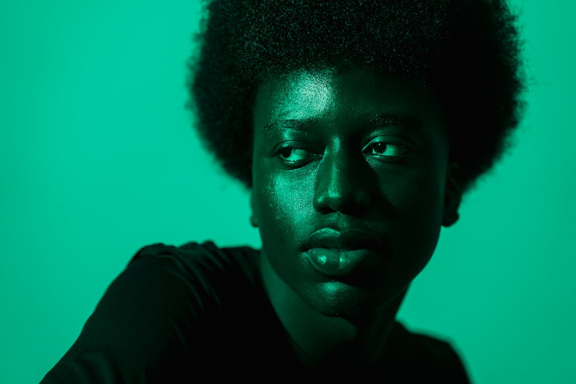 Free An Afro Man in a Black Shirt Stock Photo