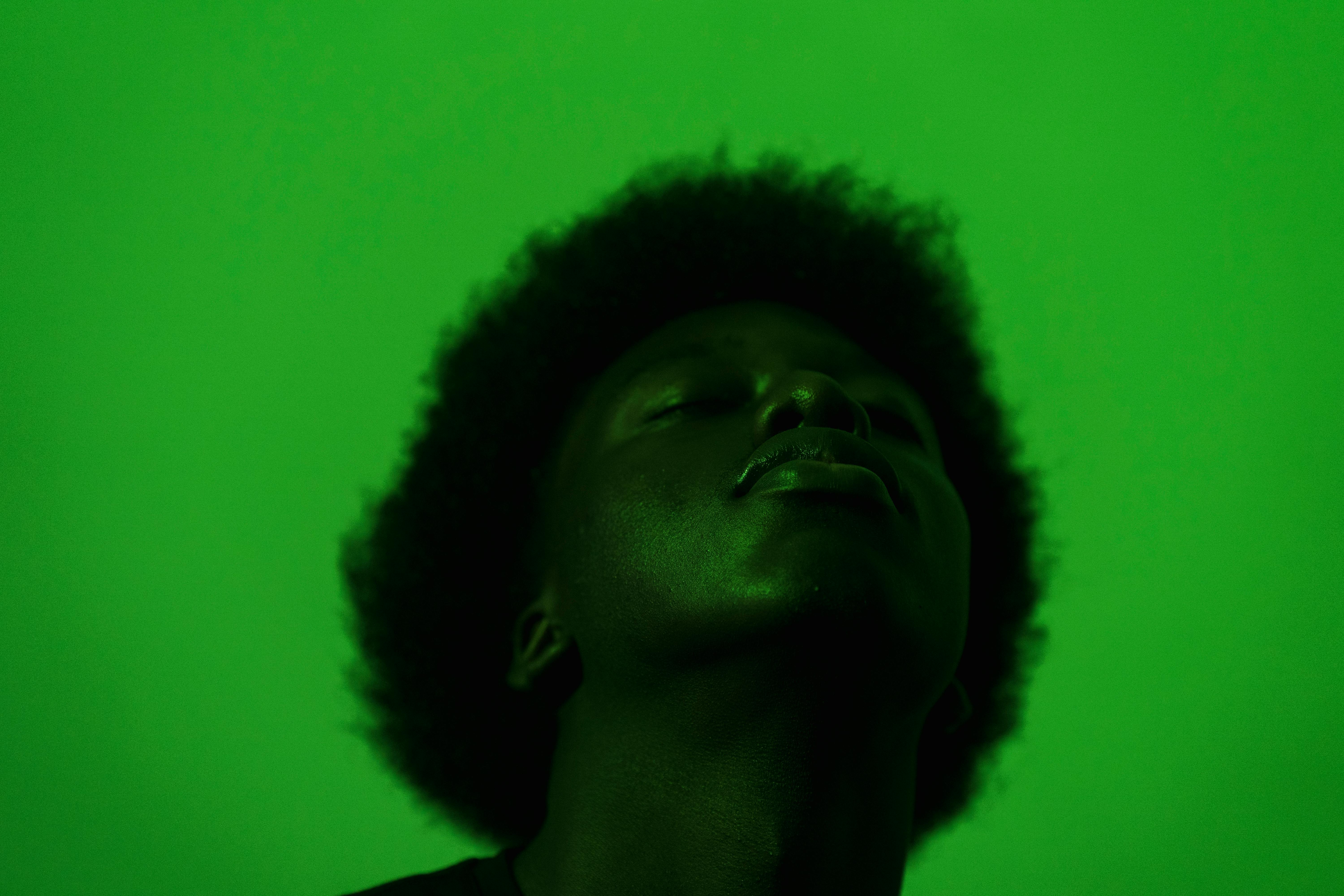 Man in Colorful Lighting · Free Stock Photo