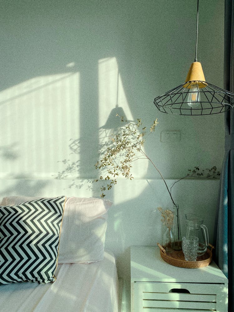 Hanging Ceiling Light Near A Bed