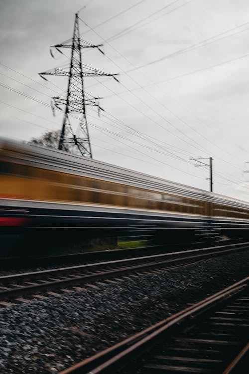 Railroad Track with Train in Motion