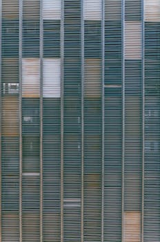 Close-up of a modern building facade in Brasília, showcasing geometric grille patterns.