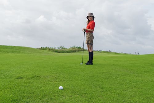 Бесплатное стоковое фото с гольф, женщина, игра