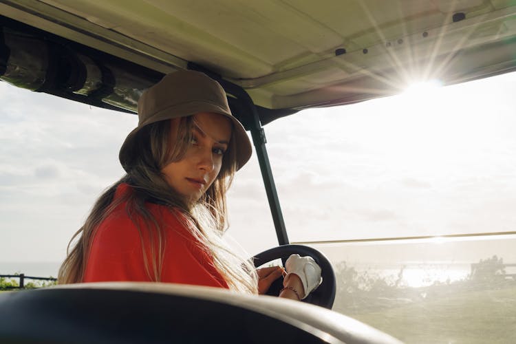 Beautiful Woman Sitting On A Buggy