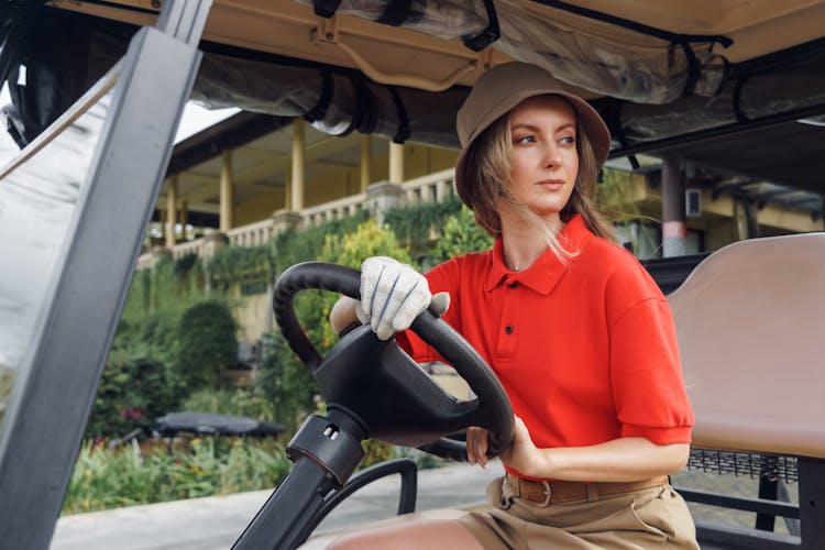 Beautiful Woman Sitting On A Buggy