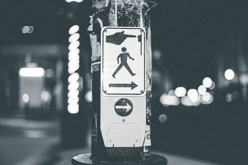 Free Grayscale Photo of a Road Sign Stock Photo