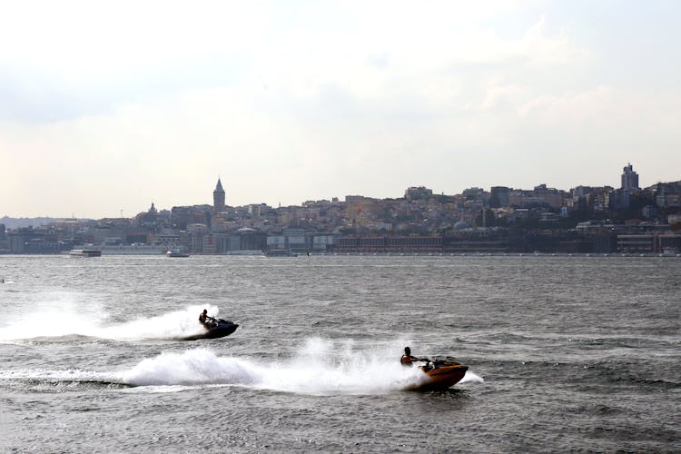 People Riding Jetski 