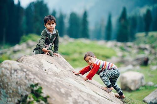 Kids Playing on the Rock