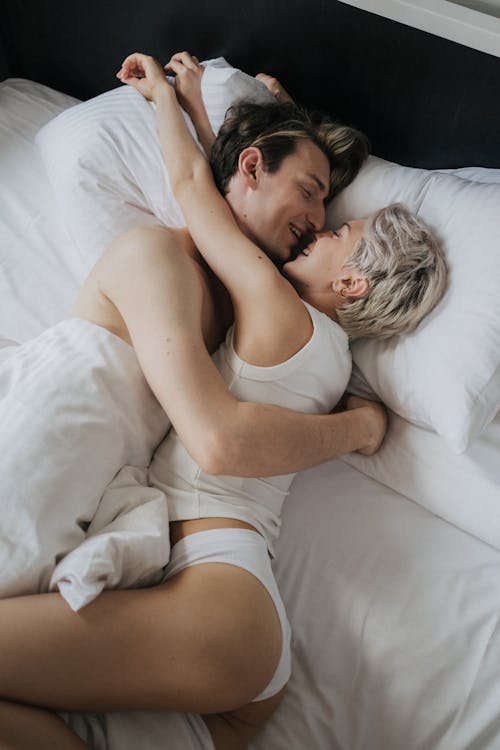 A Couple Lying on the Bed