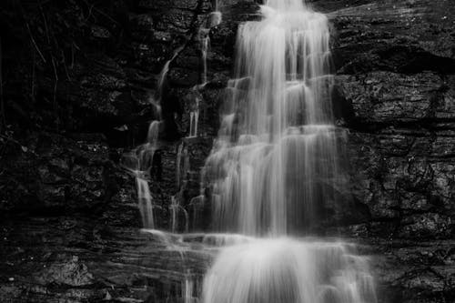 Grayscale Photo of Waterfalls
