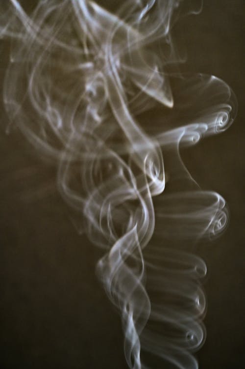 Free Smoke Formation on Black Background Stock Photo