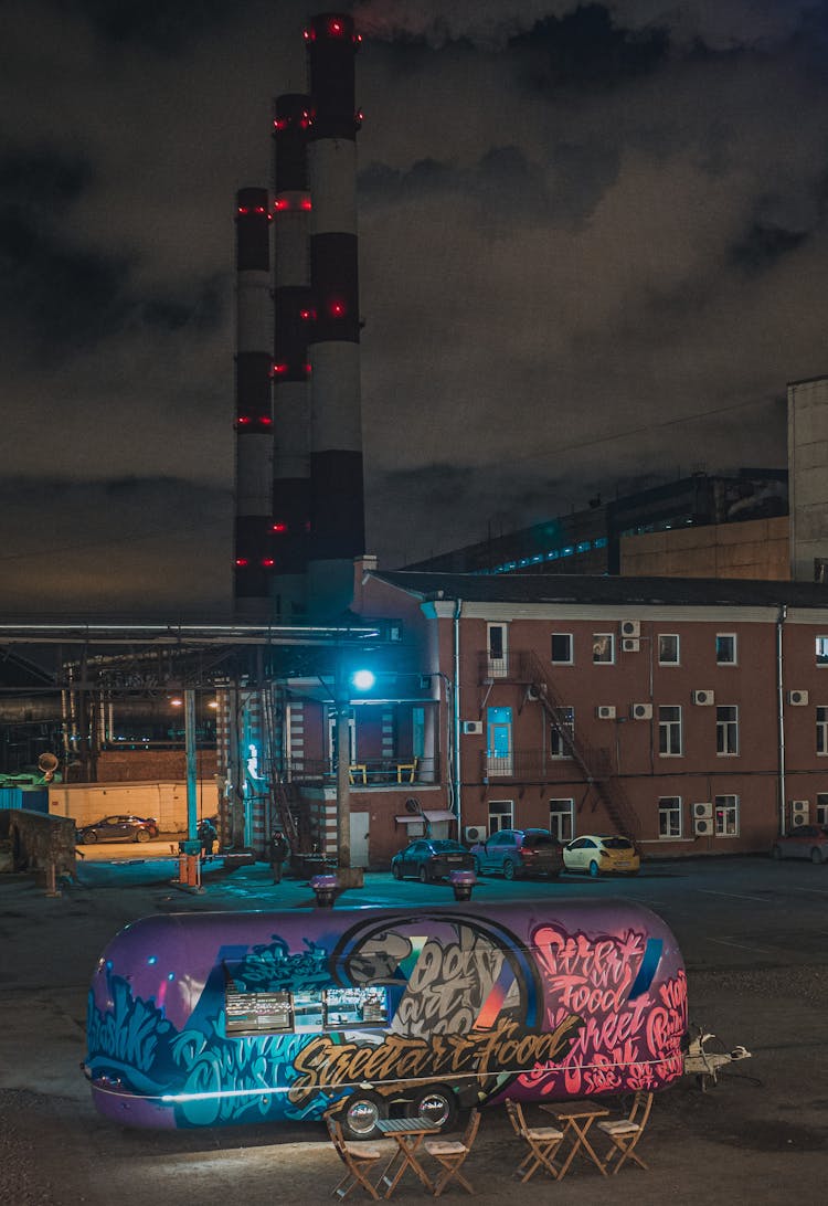 Graffiti Food Trailer In City Industrial Area